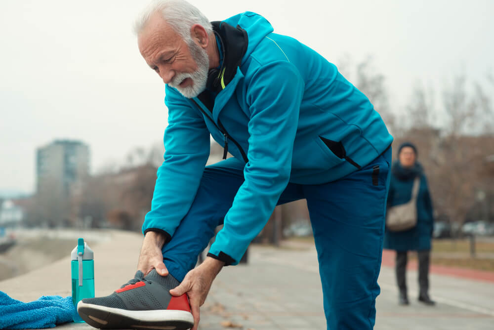 5 top causes of pain on top of your foot near the ankle shutterstock 1325169119 pain on the top of your foot