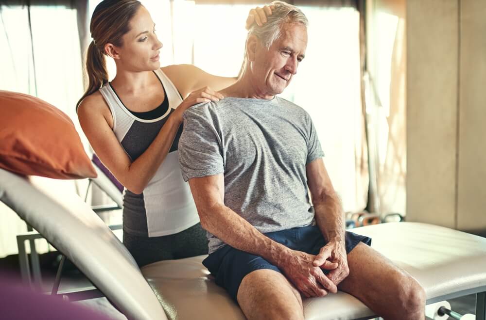 4 tips that can make living with degenerative disc disease in the neck easier in just minutes a day shutterstock 2167788743 4 tips that can make living with degenerative disc disease in the neck easier in just minutes a day
