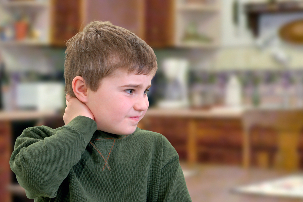 7 common causes of neck pain in children shutterstock 43223941 neck pain in children
